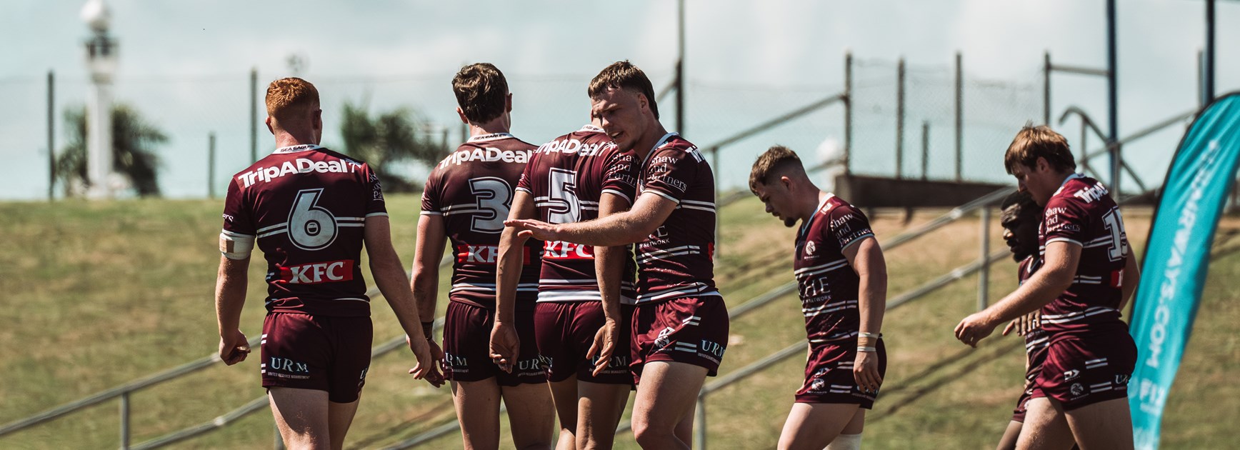 The Sea Eagles celebrate a try in the sultry conditions in Fiji today