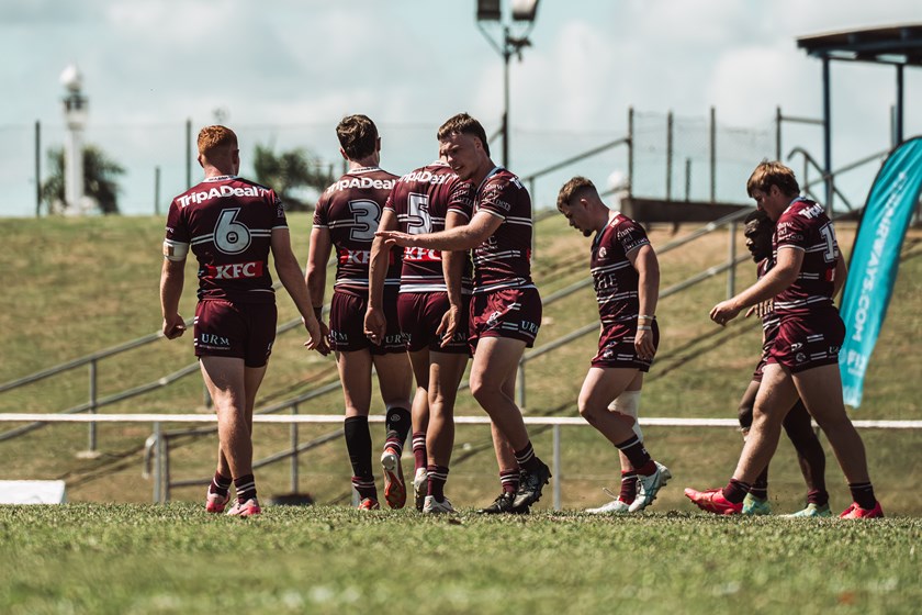The Sea Eagles celebrate a try in the sultry conditions in Fiji today