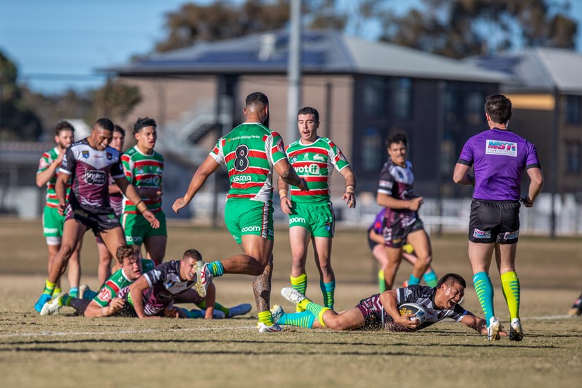 Excited...hooker Gordon Chan Kum Tong celebrates his try 