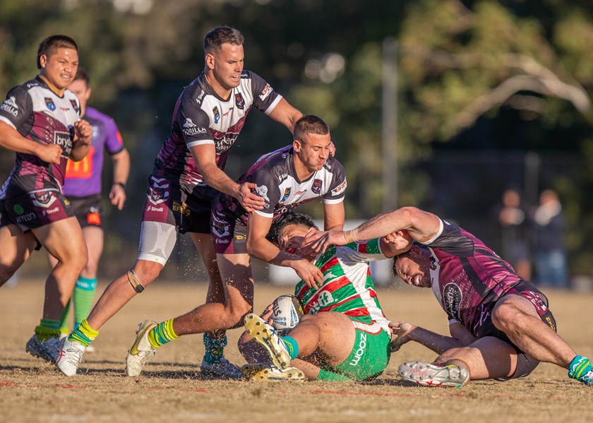 Crunch...the Sea Eagles muscle up in defence