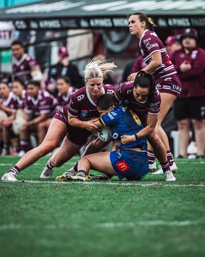 Crunch...the Sea Eagles muscle up