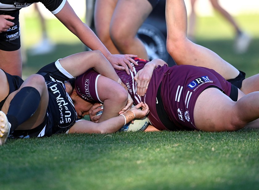 Tanika-Jazz Nobel-Bell gets the ball down for the Sea Eagles