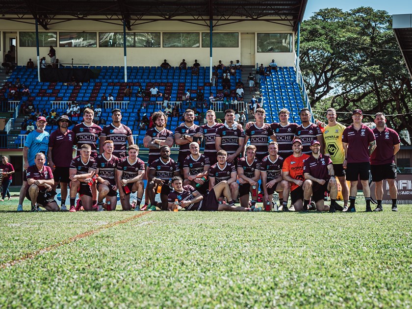 One team...Sea Eagles players and staff after their first win in Fiji