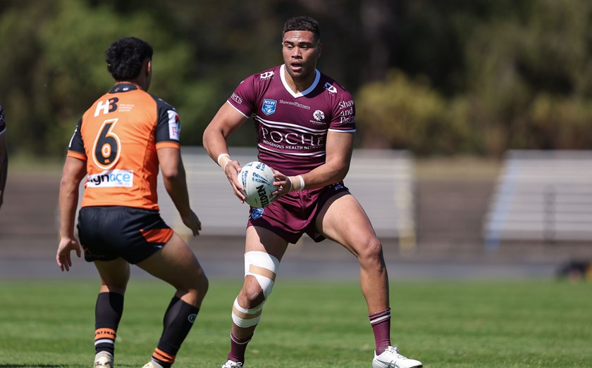 Out of my way...Prop Kylan Mafoa on the charge against the Tigers