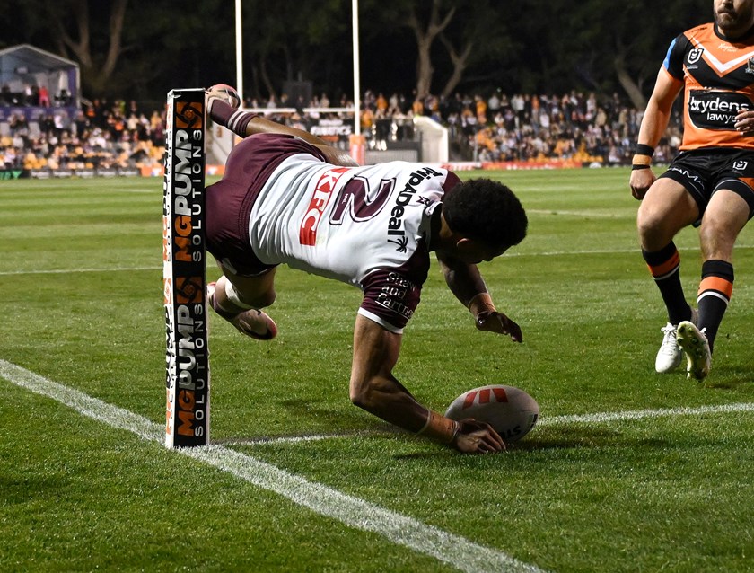 Over you go....Jason Saab crosses for the first try of the match