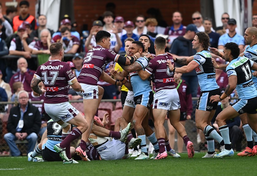 Tempers flared after Sharks centre Jesse Ramien was placed on report for a high shot on Karl Lawton 