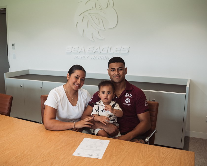 Family first...Haumole Olakau'atu with now fiancee Ana and son Ofa at the re-signing of his new Manly deal